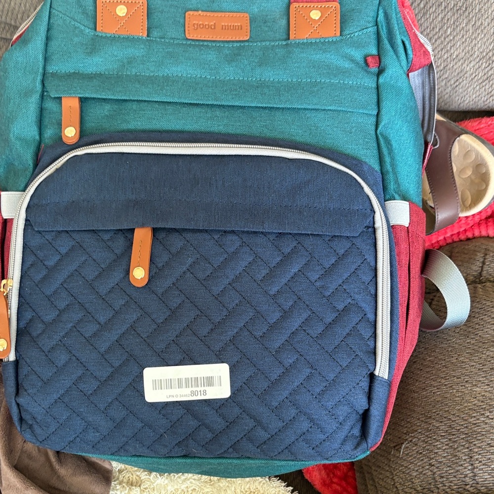 Kids diaper backpack with changing station